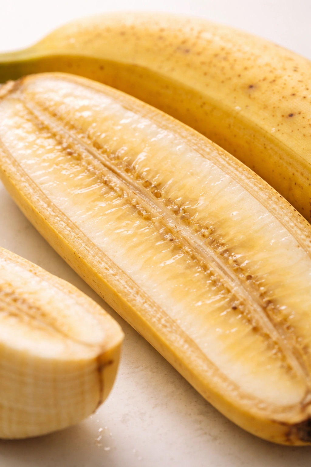 Close-up of a ripe banana cut to reveal creamy interior and natural sugars for steady energy