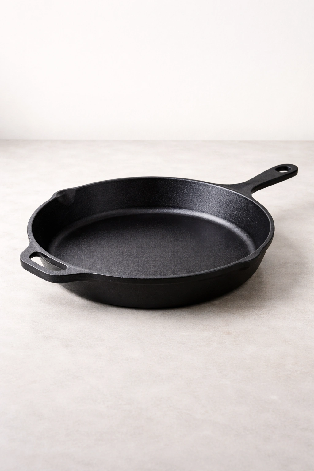 Cast iron skillet on plain countertop