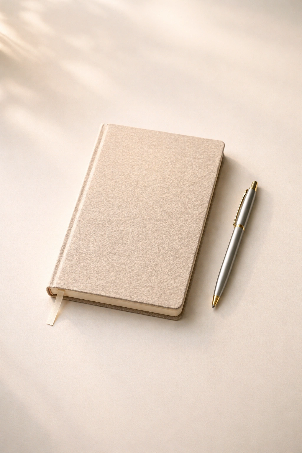 Notebook and pen on a clean table representing final thoughts