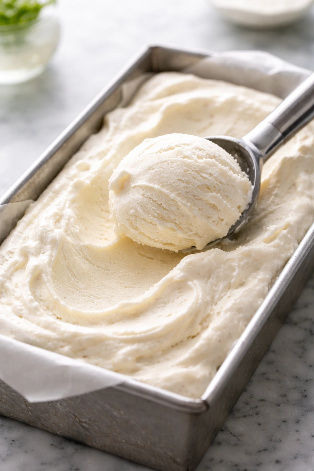 Creamy no-churn ice cream mixture in loaf pan