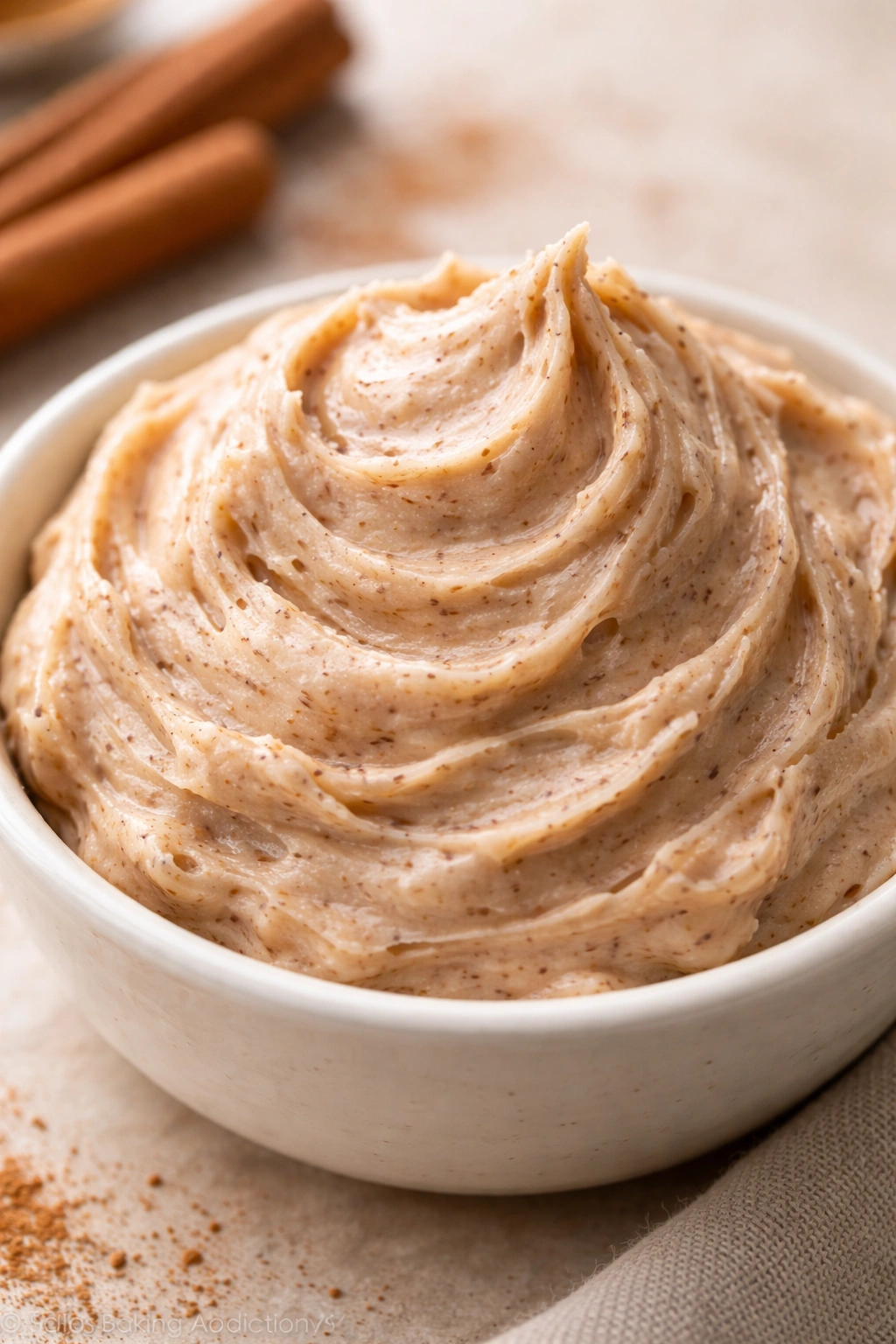 Close-up of fluffy cinnamon butter in a dish