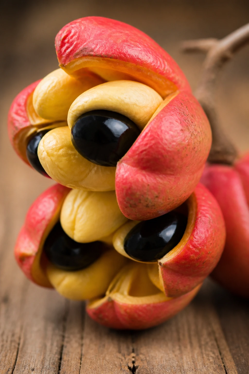 Ripe ackee fruit on wood surface ready to eat
