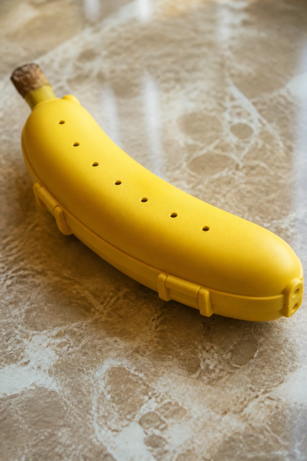 How to Pack a Banana for Your Lunch Box 10 Banana inside a protective sleeve occupying most of the frame