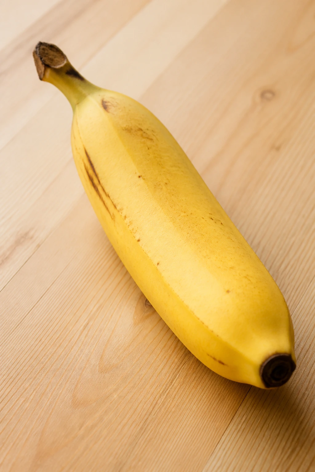 Heartburn Concerns: Do Bananas Give You Heartburn? 3 Single ripe banana on a light wooden surface