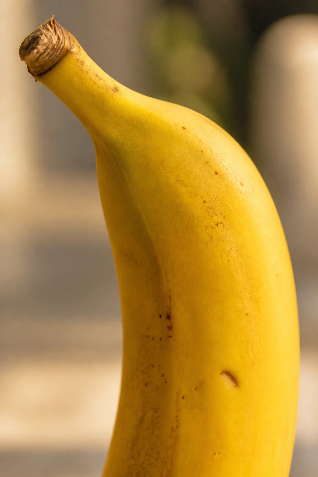 Close-up of a single ripe banana filling the frame
