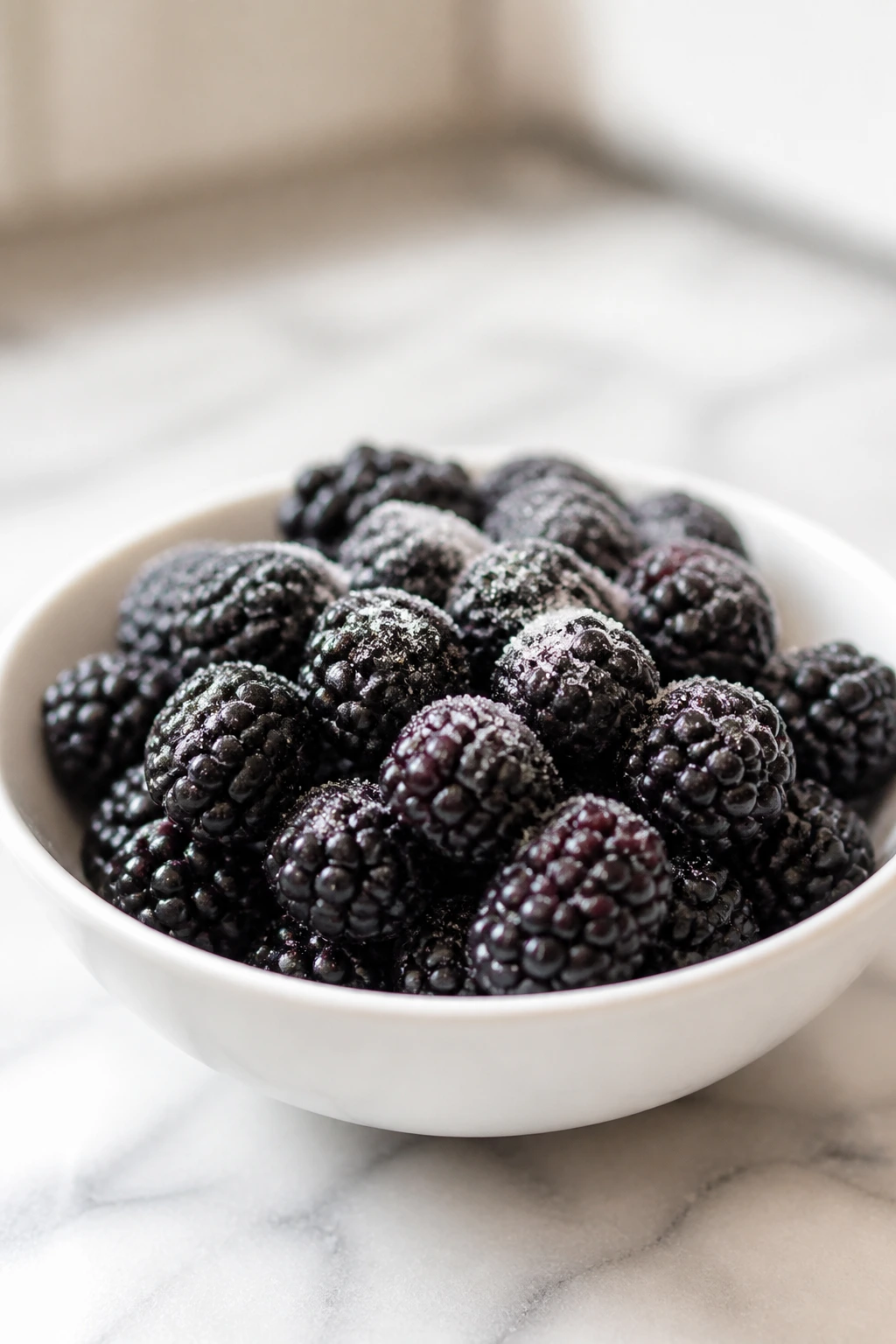 How To Take Bitterness Out Of Blackberries 3 Blackberries with sugar sprinkled in a bowl