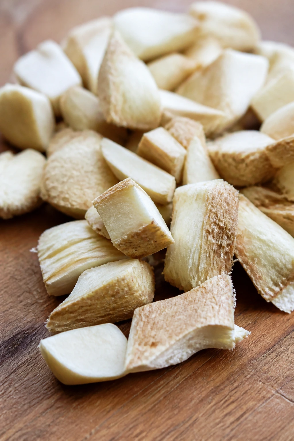 Are Mango Seeds Poisonous To Dogs? All You Need To Know 6 Close-up of mango seed fragments on a wooden surface