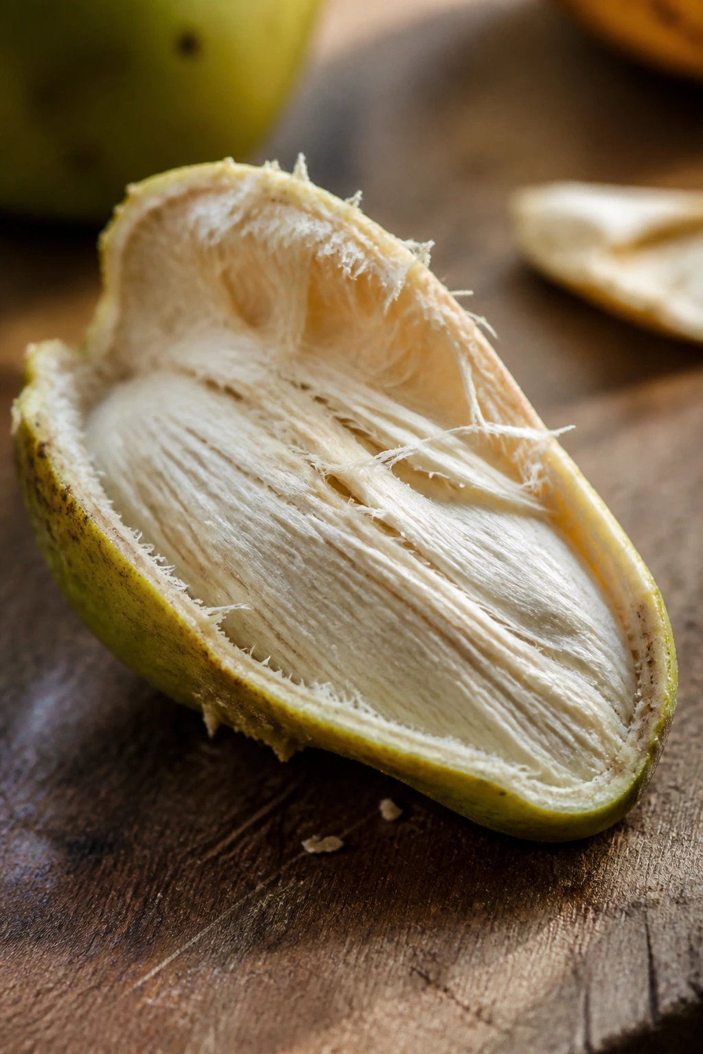 Close-up cross-section of a mango seed showing the kernel