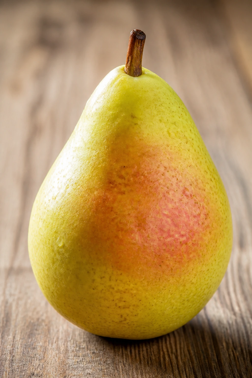Is Pear A Tropical Fruit? All You Need To Know 3 Close-up of a pear on a bright counter with natural daylight