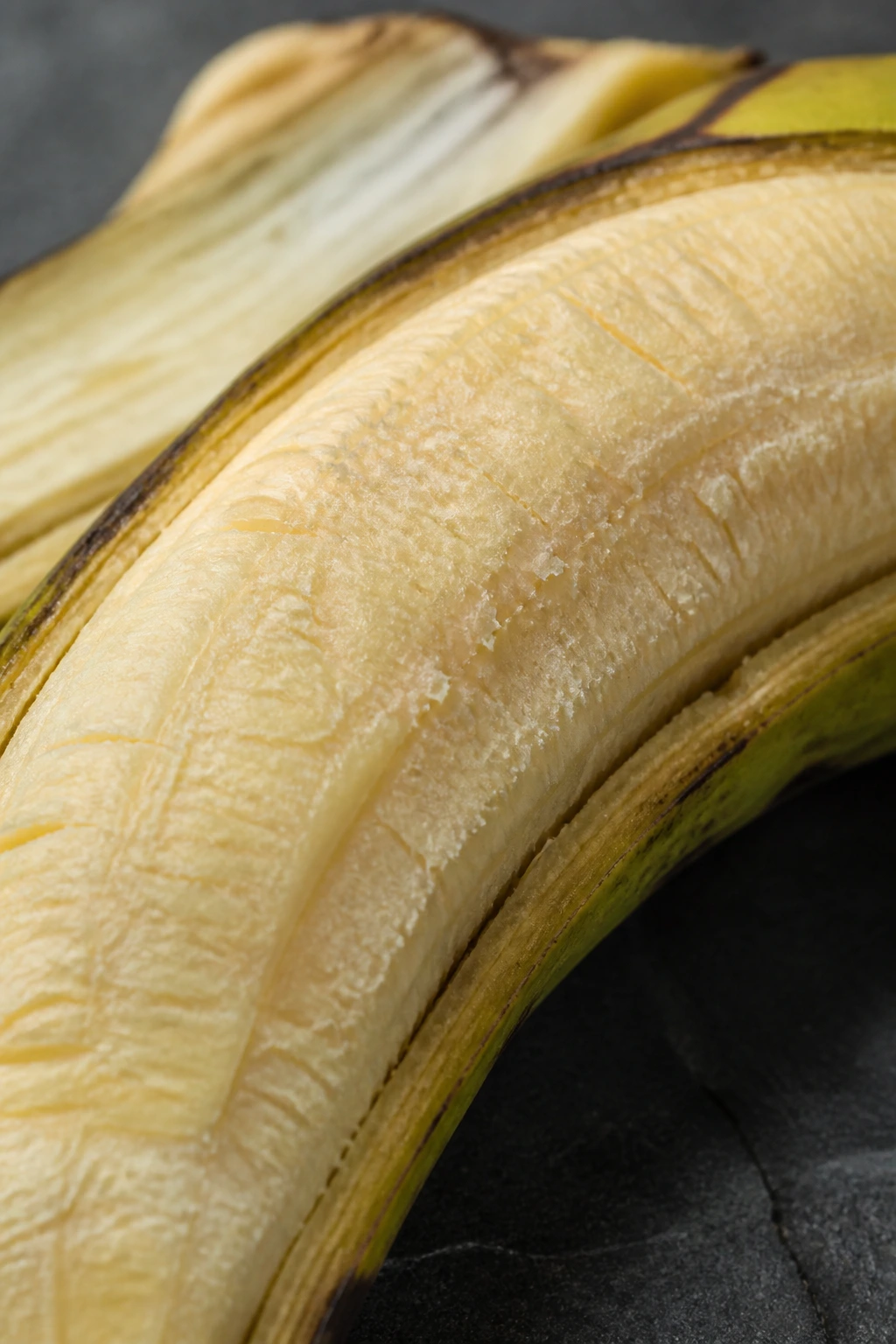 Is Plantain Good For Weight Loss? Yes, And Here's Why 2 Macro view of peeled plantain showing pale starchy interior