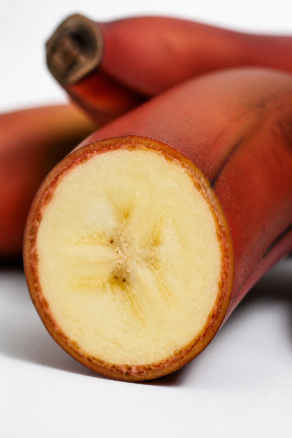 What Are Red Bananas? Description, Uses, Benefits, & More 7 Cross-section of ripe red banana showing pale flesh